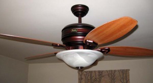This ceiling paddle fan creates a comfortable breeze. It also includes heating elements and a thermostat for winter heating.  