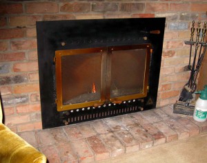 Keep tight-fitting fireplace doors closed when there is a fire burning. When the fire is out, close the chimney damper and the doors to block room air loss. 