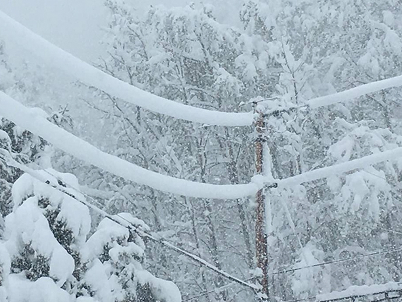 Sagging power lines from heavy snow