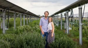 Byron Kominek and his partner Alexa Hapgood
in summer 2022 at Jack's Solar Garden. Photo
courtesy of Colorado Agrivoltaic Learning Center.