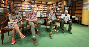 Doctor Annie Fenn, author of The Brain Health Kitchen (left), Patrick Regan (Travis and Mace’s co-author of A Mile at a Time), Travis, and Mace speak to a crowd at the Tattered Cover Book Store in Denver during their book tour.