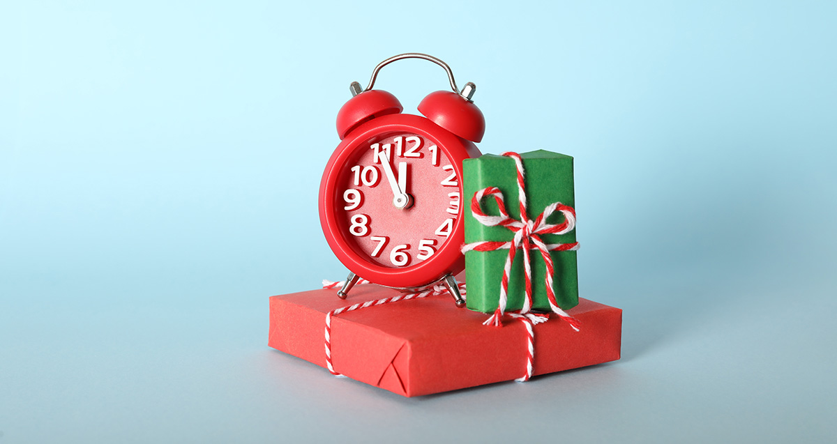 Alarm clock on a present package to indicate last minute gifts